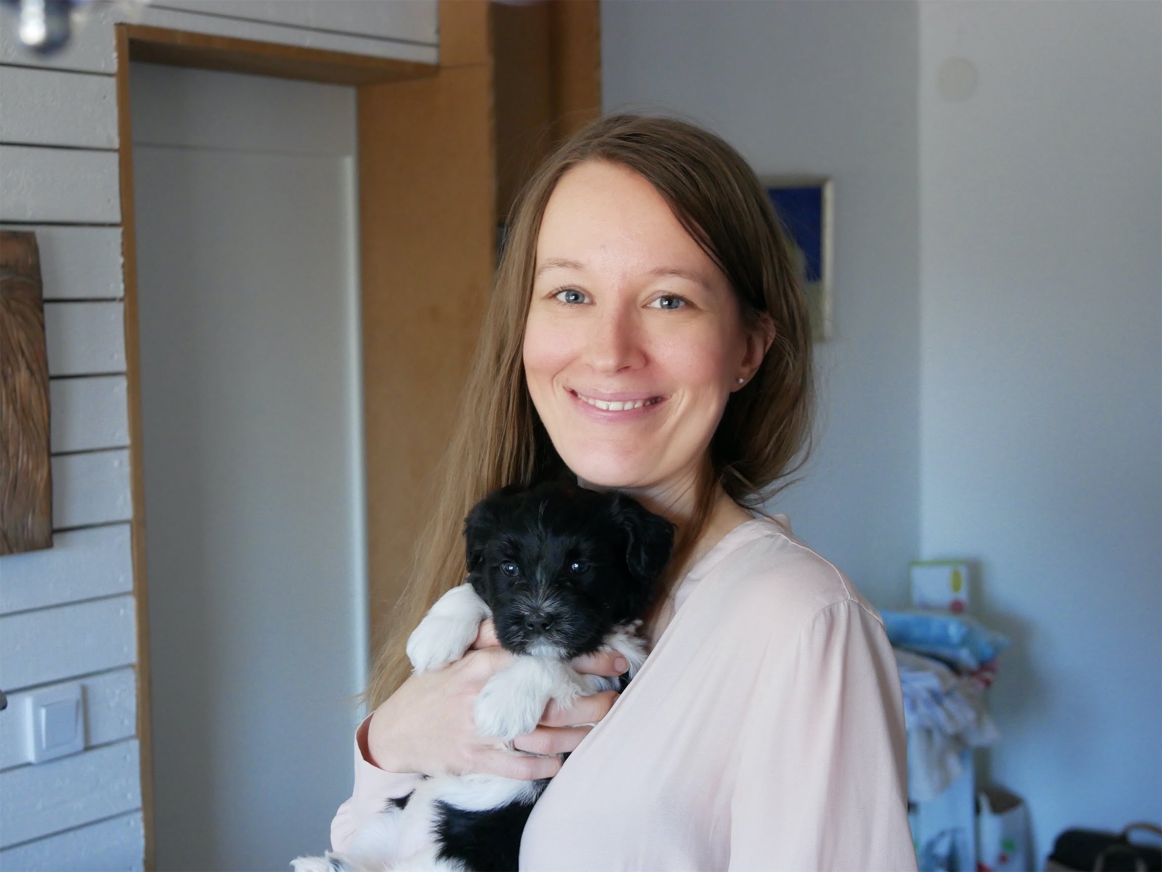 Femke de Grijs with a Schapendoes puppy of 5 weeks
